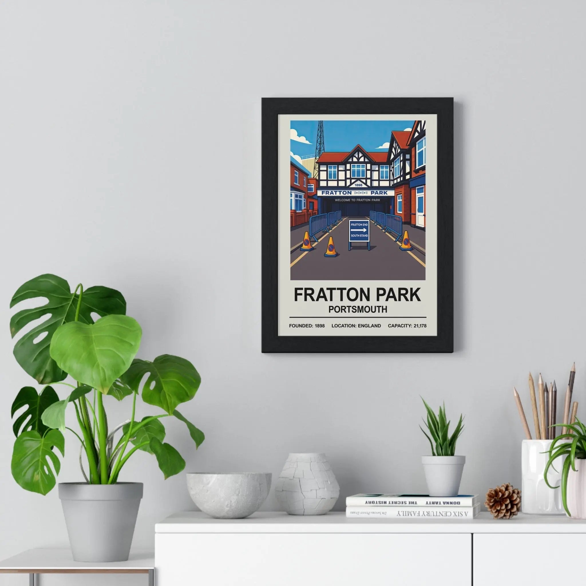 Black-framed poster featuring colorful illustration of fratton park portsmouth stadium in england print design