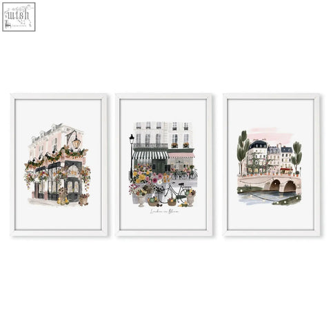 Set of three poster art london framed watercolor prints with soft pastel parisian street scenes in white frames