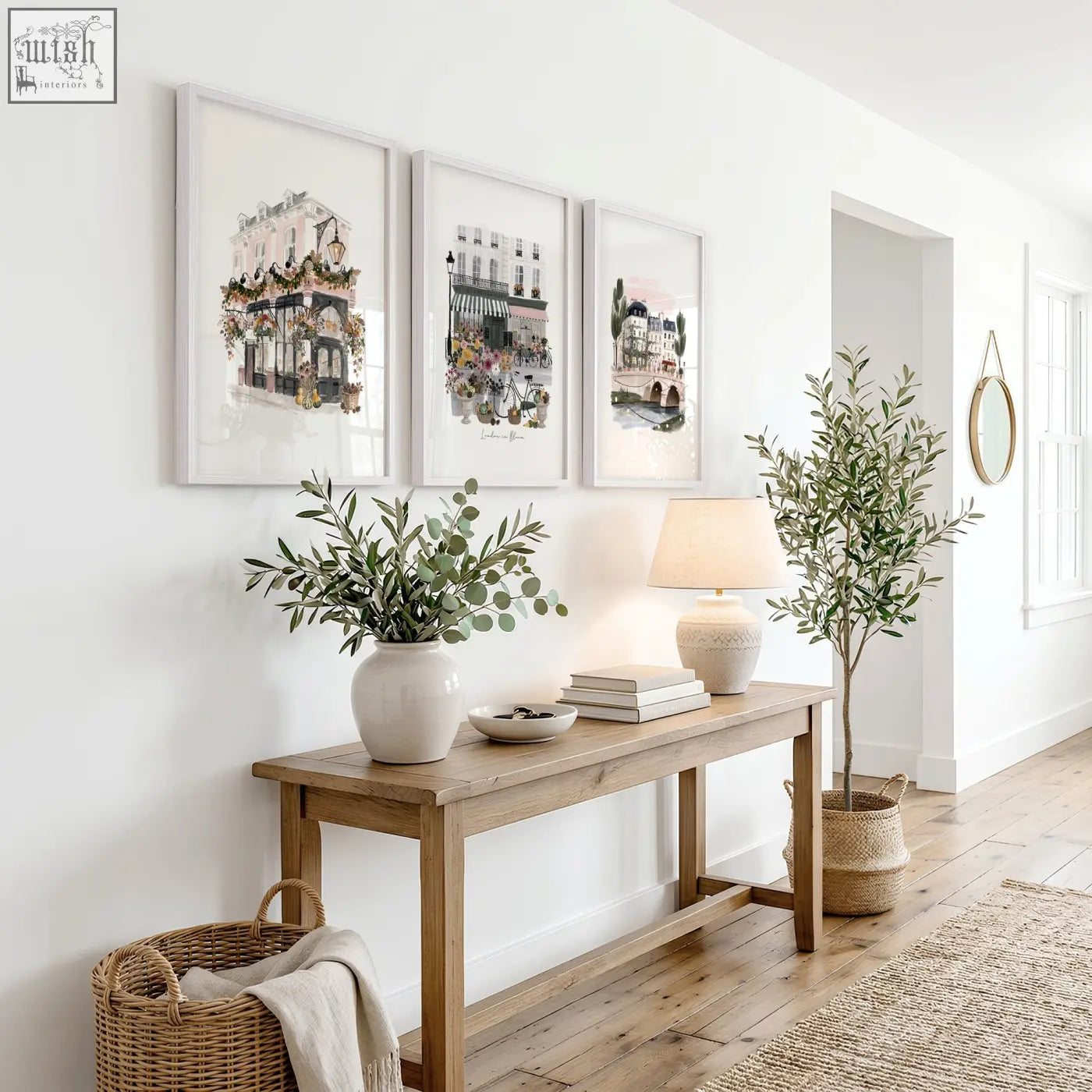 A white ceramic vase with eucalyptus branches featured in poster art london floral city scene wall art prints set of 3