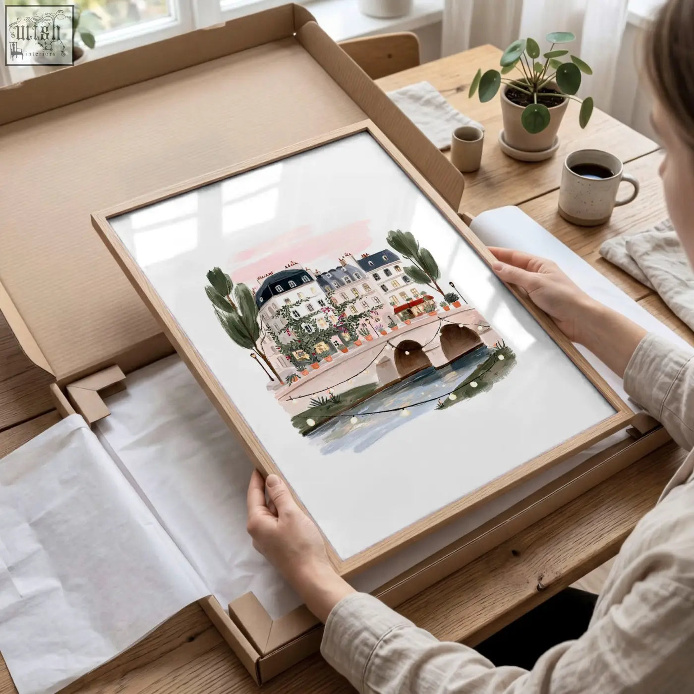 A framed watercolor poster art london print of a parisian street scene with buildings trees and a bridge