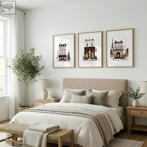 Three framed wooden posters of parisian street scenes titled paris pour toujours wall art above a bedroom bed