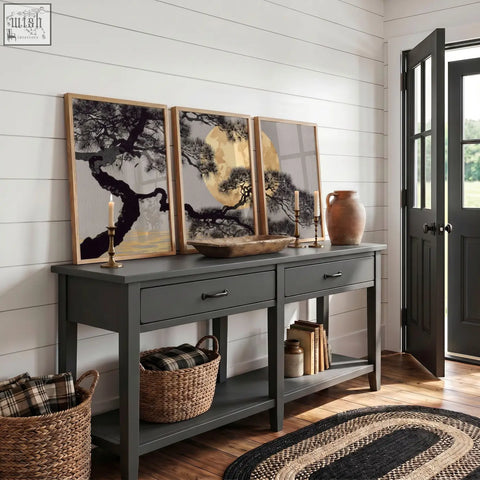 Dark gray console table with two drawers and open shelf featuring simple black handles below japanese pine wall art prints set of 3