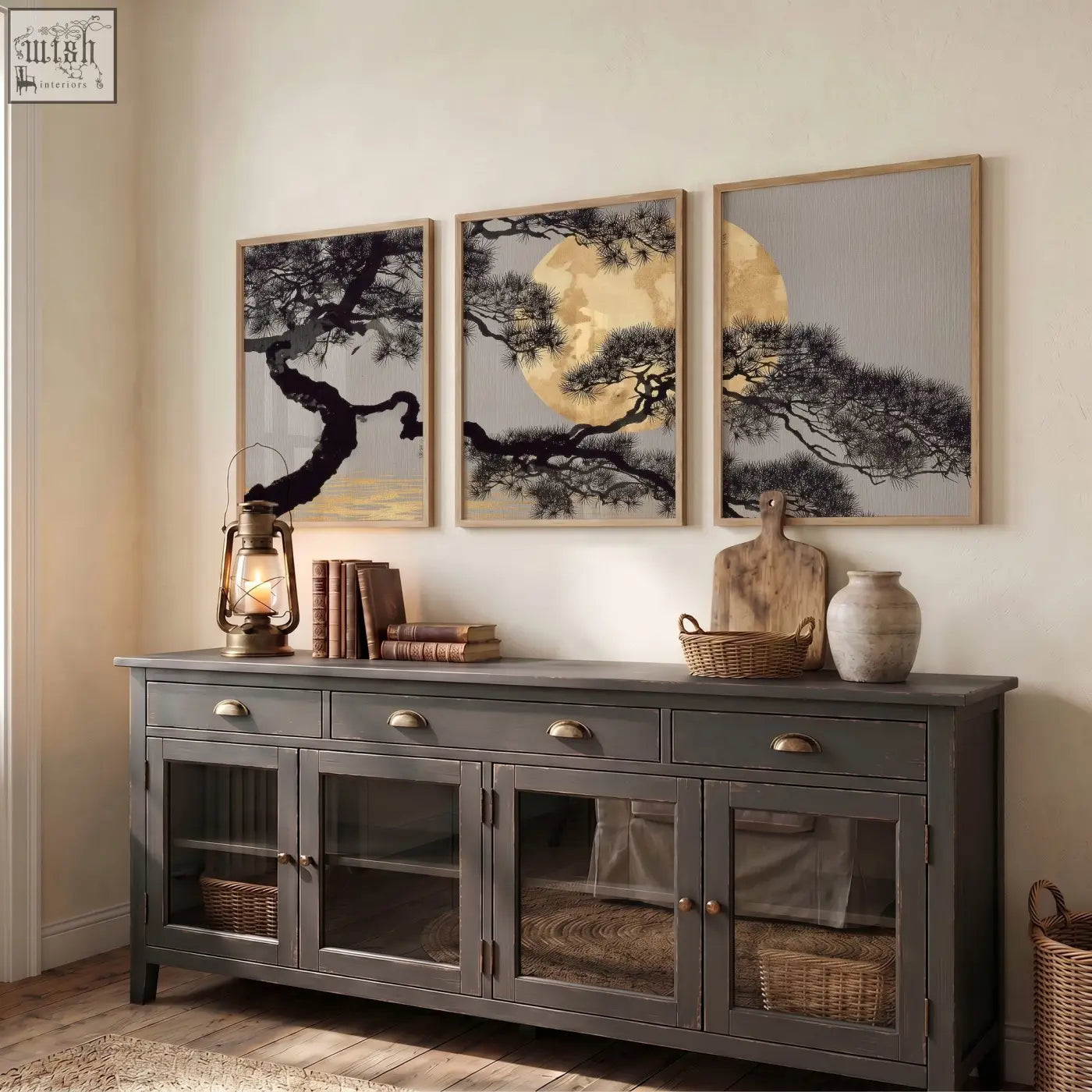 Dark gray wooden sideboard with glass-paneled doors and brass handles paired with japanese pine wall art posters