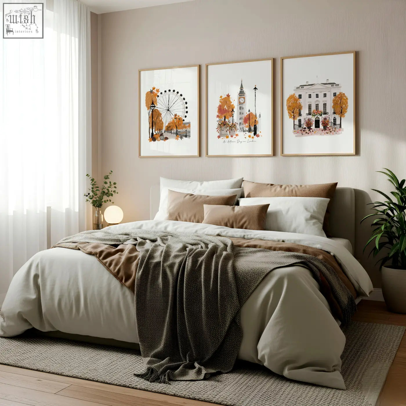 A cozy bed with beige and brown bedding and a dark gray throw in front of big ben london england art prints