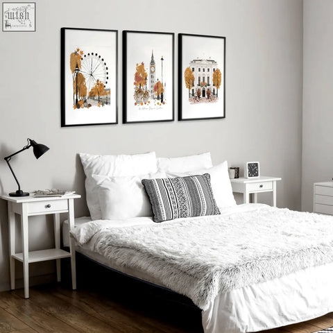 Set of three black-framed art prints featuring big ben and london england landmarks in autumn watercolor style