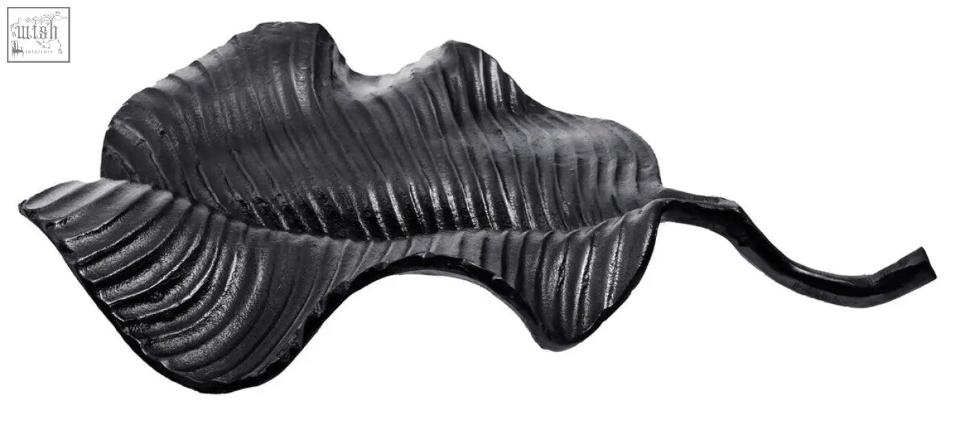 Prato black leaf dish made of cast iron with black finish textured ridged surface and curved stem for serving