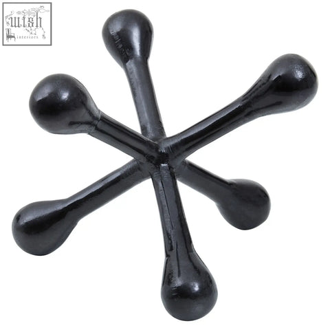 Prato black nickel finish jack sculpture with glossy black star shaped design and five symmetrical arms