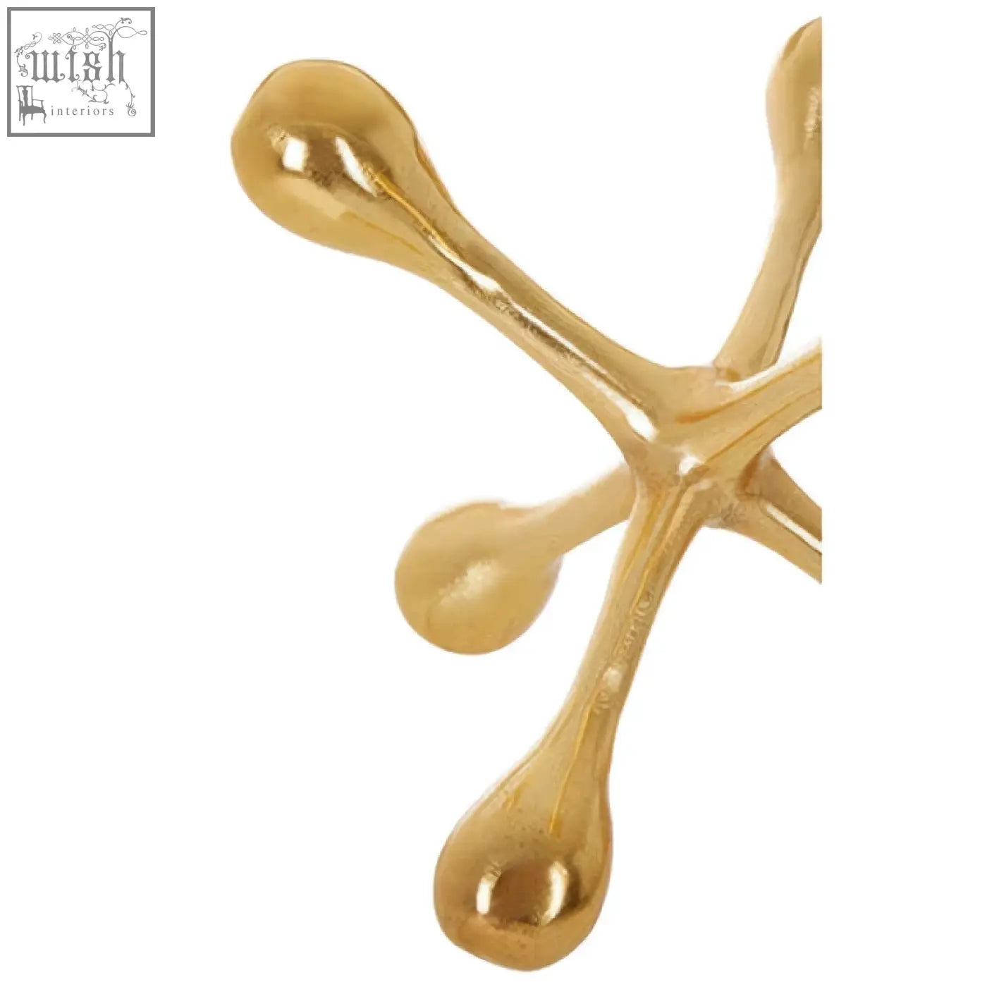 Gold finish prato jack sculpture with modern abstract design in gold-colored metal resembling branching limbs