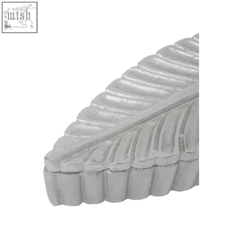 Silver plume box with textured ridged surface shaped like a decorative silver leaf in prato silver finish