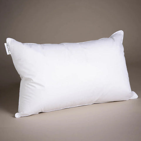 White rectangular premium hypoallergenic microfibre pillow with smooth fabric cover and stitched edges for all sleep positions