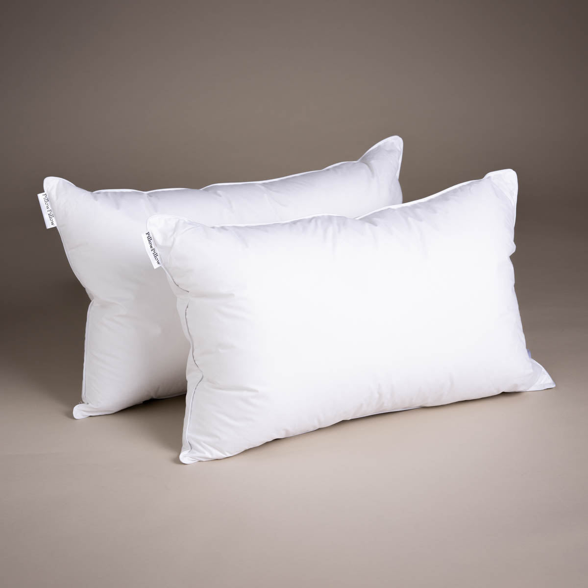 White rectangular microfibre pillow with soft plush fabric and subtle stitching premium hypoallergenic microfibre pillow