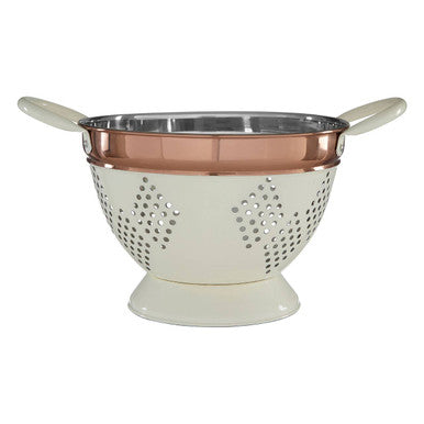 Cream-colored prescott medium colander with copper rim and stainless steel interior featuring diamond perforations