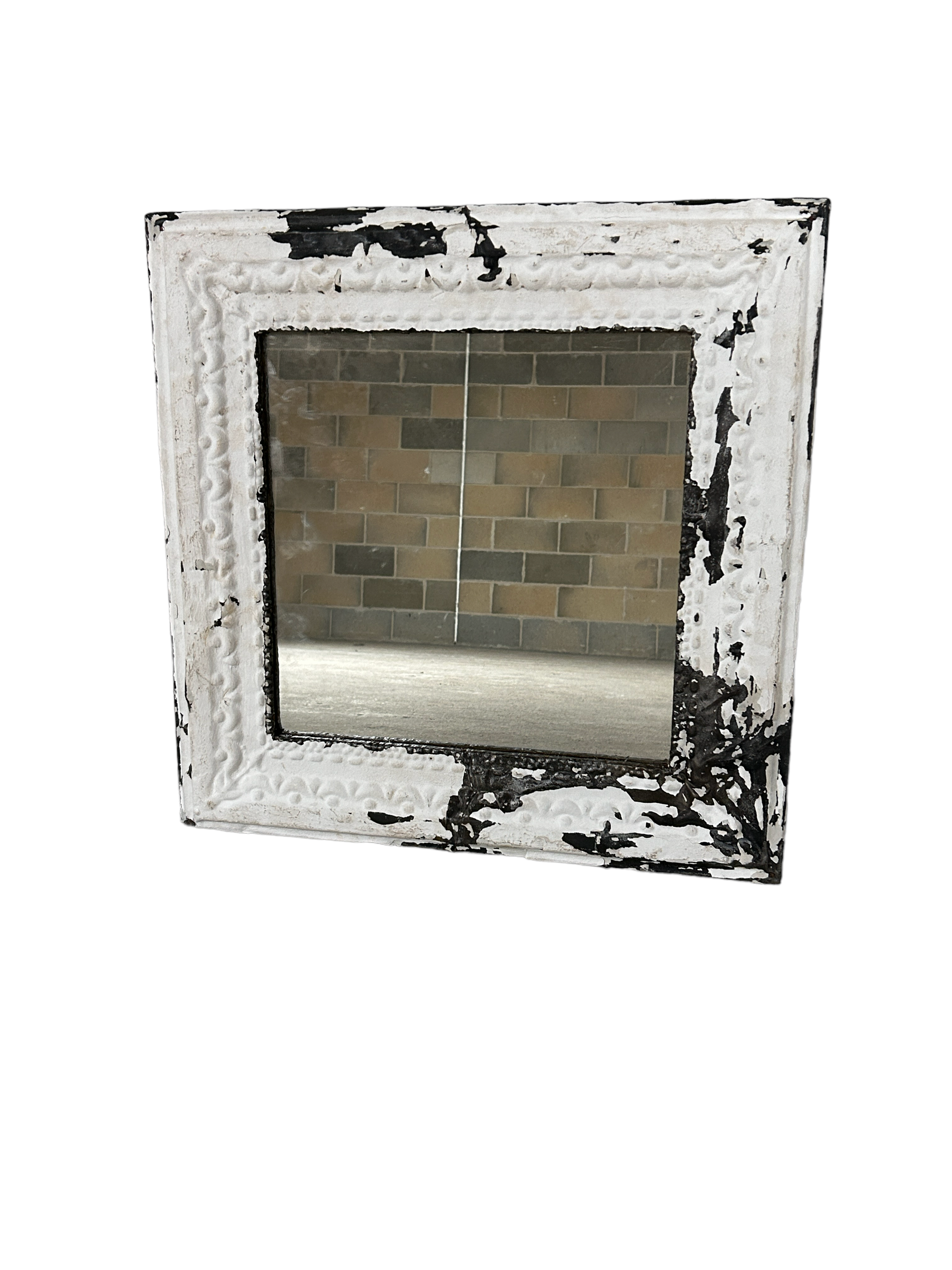 White distressed metal pressed tin ceiling tile mirror with ornate frame and chipped black paint undertones