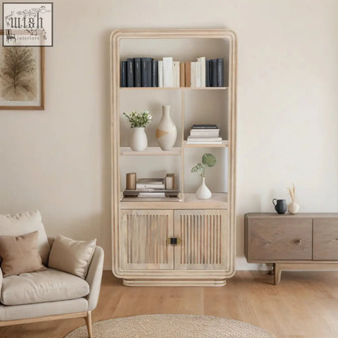 Light wood-toned preston bookcase with vertical slat cabinet doors made from sustainably sourced mango wood