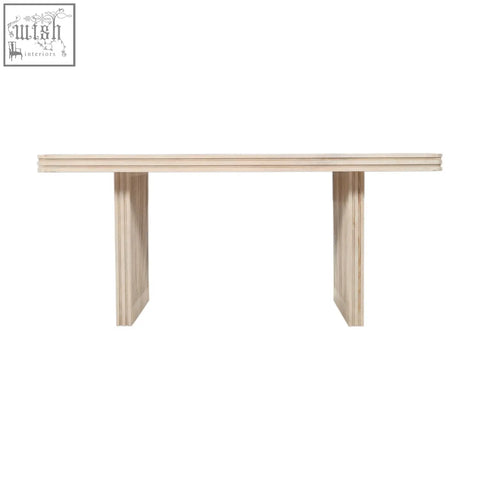 Minimalist mango wood dining table in light wood with clean lines and stacked panel legs for modern dining spaces