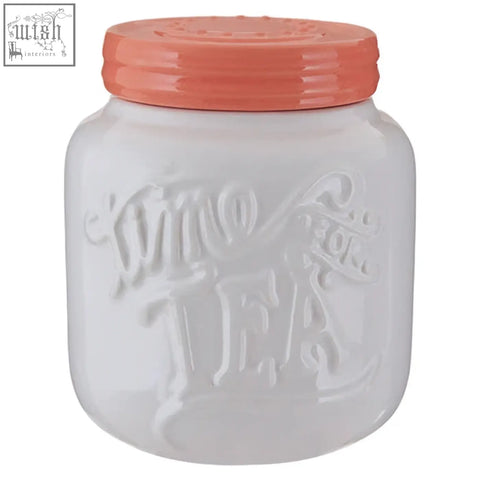 Pretty things tea canister white ceramic jar with embossed mino tea lettering and coral screw-on lid