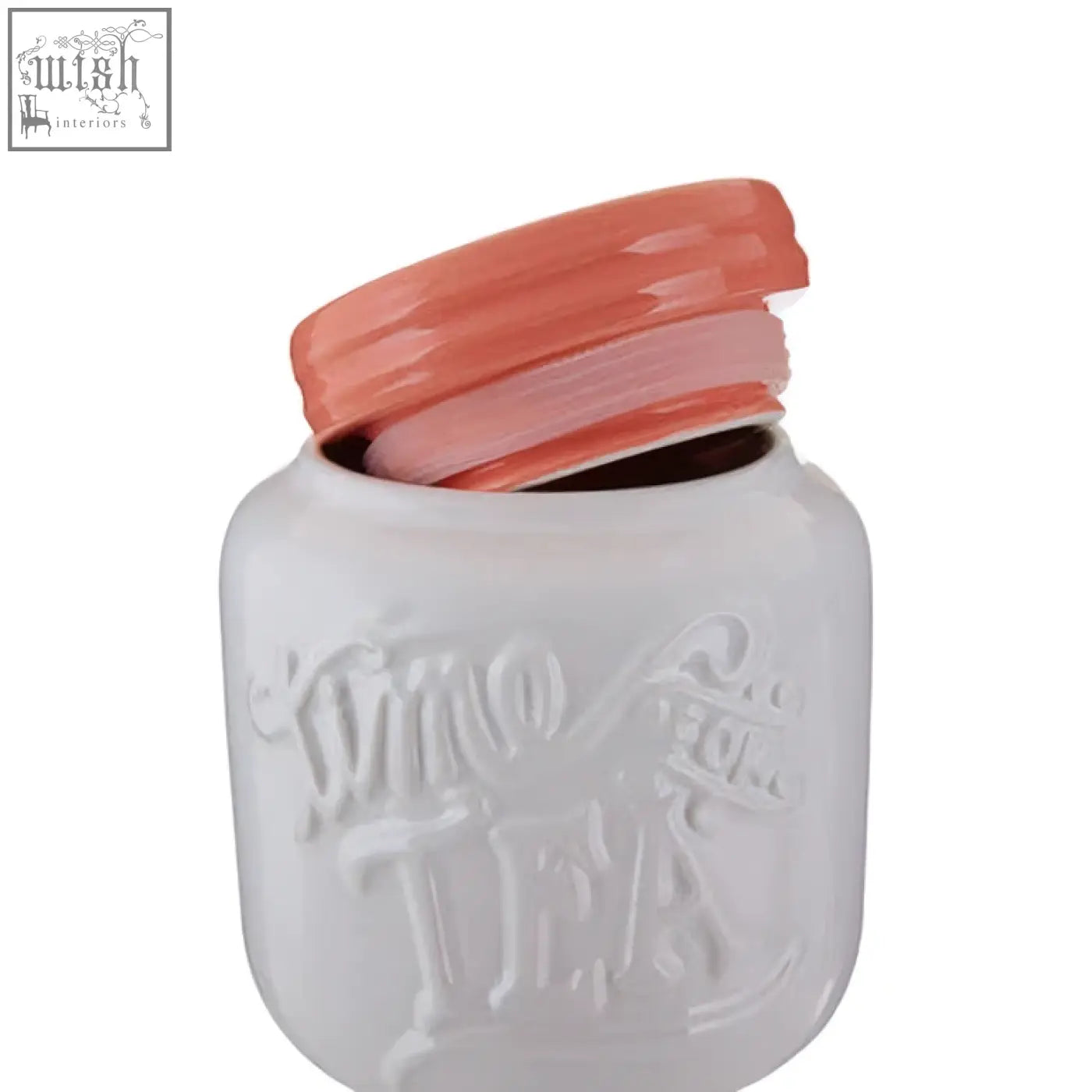 White ceramic mason jar style tea canister with coral lid and embossed since tea lettering from pretty things tea