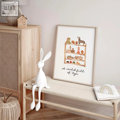 A framed bohemian wall art print with a wooden toy shelf and cursive text for nursery decor