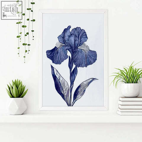 A framed blue iris botanical wall art print with delicate shading in a minimalist white frame for bathroom decor