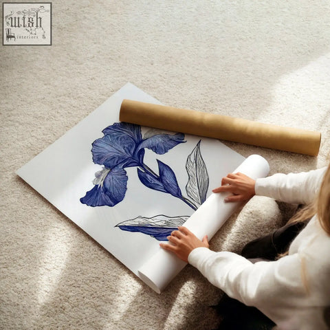 A detailed blue iris illustration on white paper roll from a set of 3 botanical wall art prints for bathroom decor