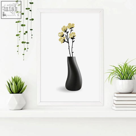 Black ceramic vase with sleek curves holding pale yellow flowers featured in botanical wall art prints for bathroom walls