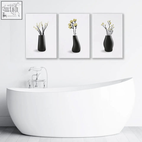 Set of 3 minimalist black ceramic vases with pale yellow blossoms perfect for botanical wall art on bathroom walls