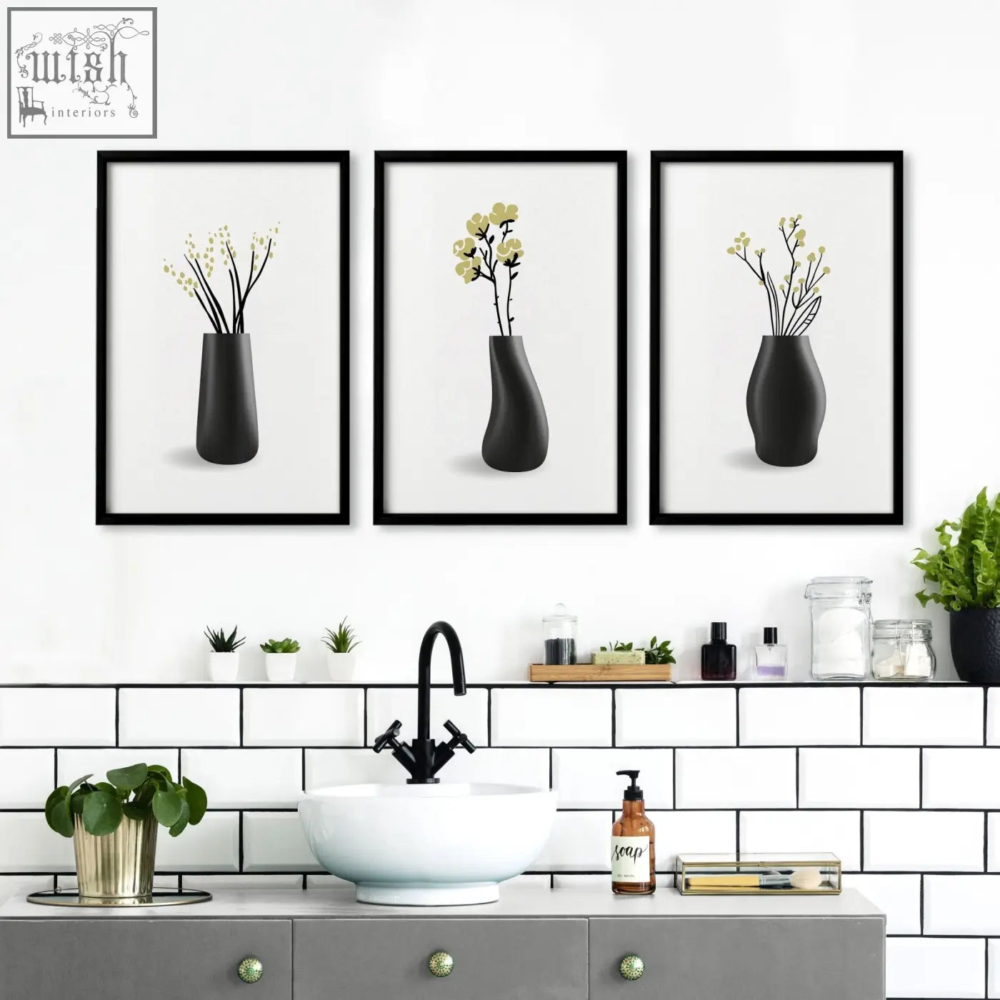Set of three black framed botanical wall art prints with minimalist designs perfect for bathroom walls