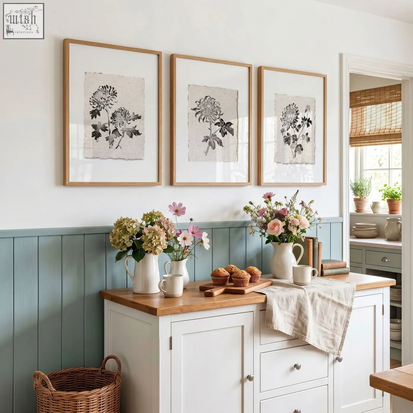 Three framed prints of black botanical chrysanthemum wall art on beige paper in light wood frames for french country decor