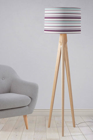 A modern tripod floor lamp with a purple striped lampshade perfect as a table lamp or ceiling lamp shade