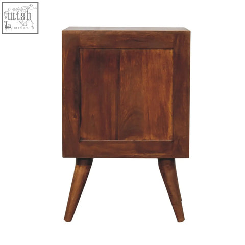 A rustic brown quad bedside table made of solid mango wood with a square top recessed panel door and tapered legs