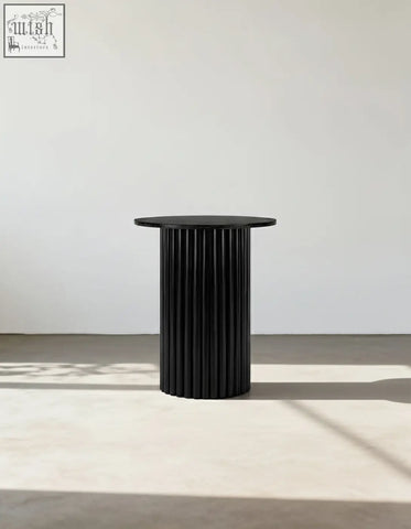 Qualls round side table in black with ribbed marble surface and smooth matte top offers financing options