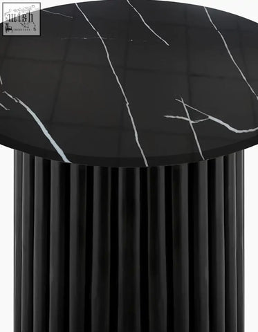 Qualls round side table with black marble surface and vertical fluted legs offering stylish marble finish and offer financing