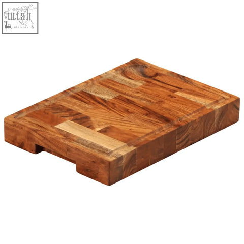 Rectangular chopping board made of solid acacia wood with warm brown tones and a rustic patchwork design
