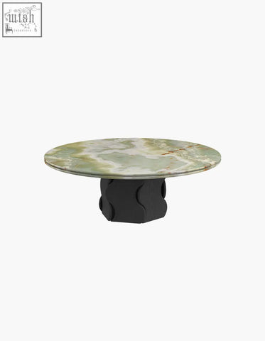 Quintero round coffee table with green and white veined marble top and black sculpted solid wood base