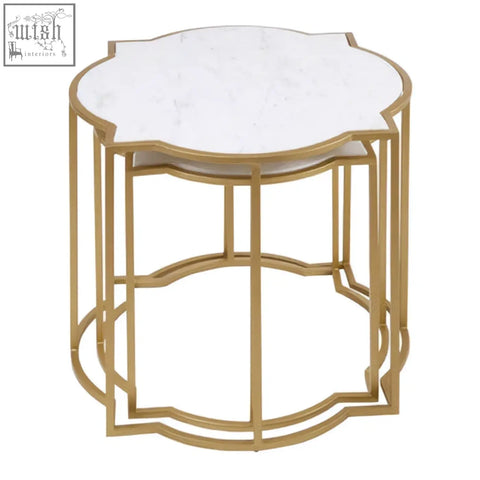 Rabia set of 2 gold-toned metal nesting side tables with white marble tops and ornate scalloped edges for upscale styling
