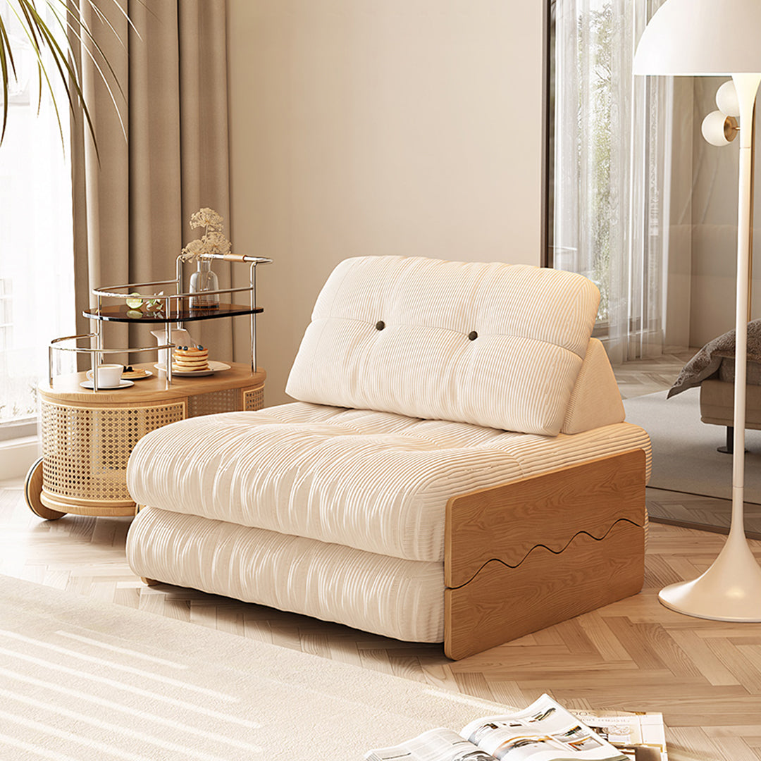 Cream corduroy rachman sleeper armchair single seater bed with wooden frame and tufted backrest for cozy seating