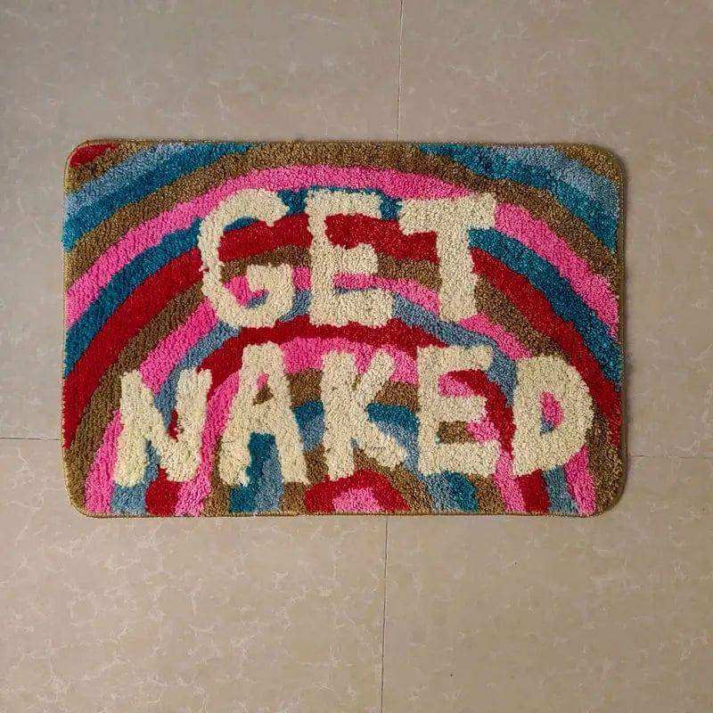 Colorful plush naked bathmat with get naked cream letters on rainbow pink red blue brown stripes for bathroom use