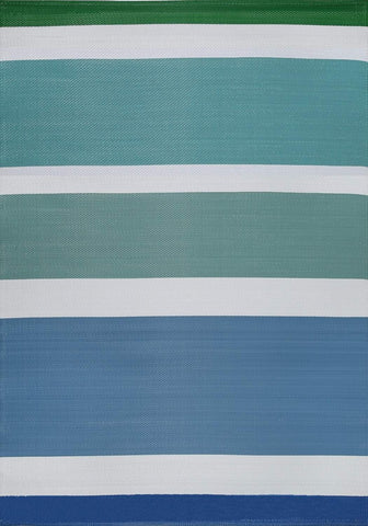A rainbow outdoor rug with textured fabric featuring blue and green stripes separated by white bands for outdoor use