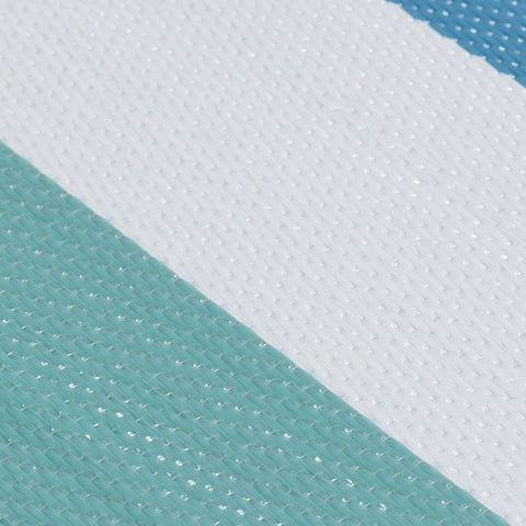 Teal and white woven fabric with textured diamond pattern on rainbow outdoor rug blue perfect for outdoor use