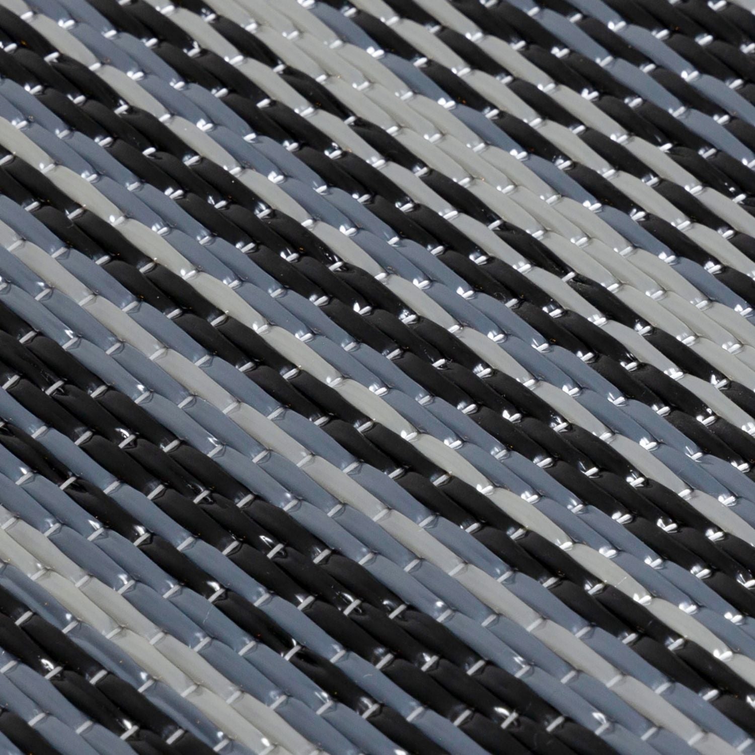 Dark grey woven strap with textured interlaced pattern from rainbow outdoor rug dark perfect for outdoor use