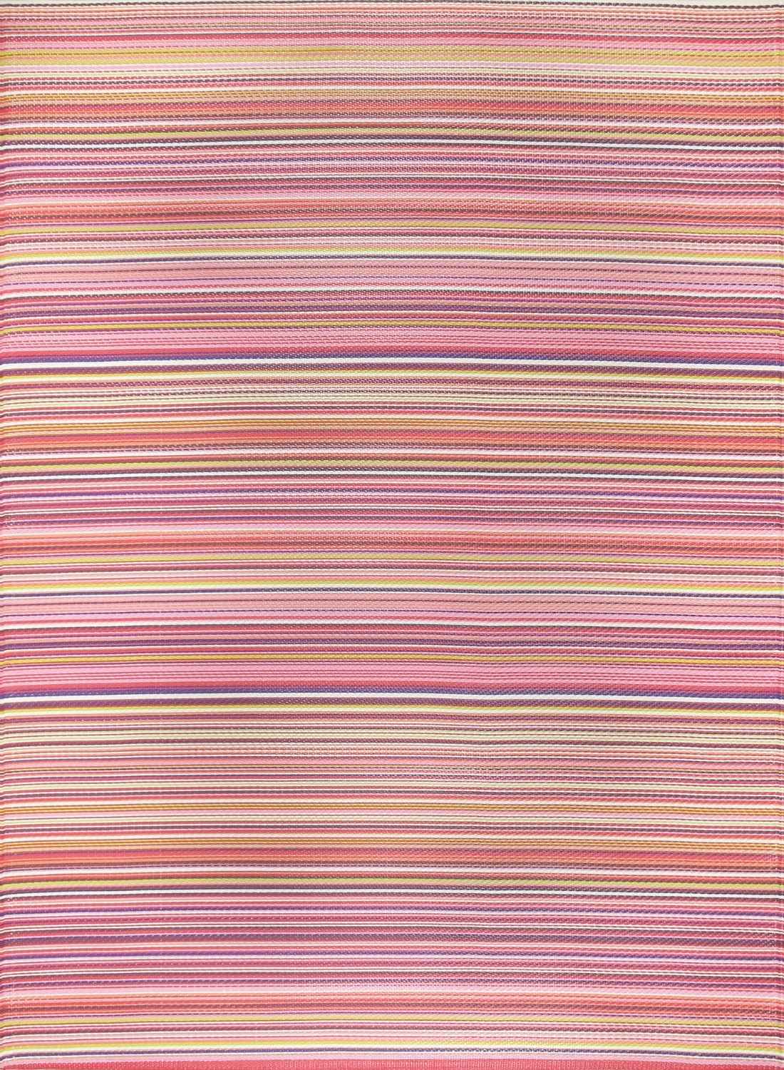 A woven rainbow outdoor rug pink with horizontal stripes in shades of pink peach lavender and cream for outdoor use