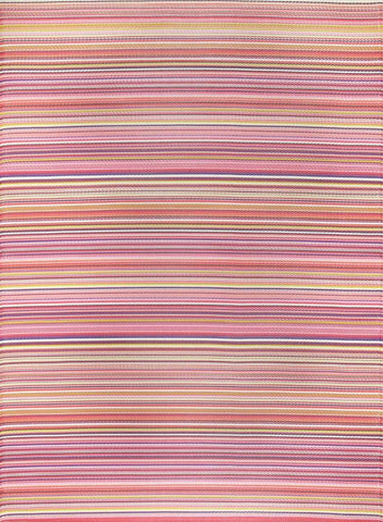 A woven rainbow outdoor rug pink with horizontal stripes in shades of pink peach lavender and cream for outdoor use
