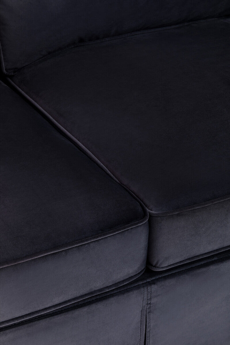 Black velvet sofa cushion from Ralph three seat velvet sofa with clean stitched edges and plush soft texture