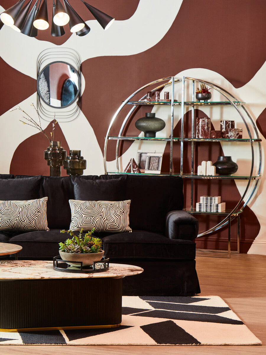 Ralph three seat black velvet sofa with geometric patterned throw pillows in rich black velvet upholstery