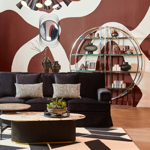 Ralph three seat black velvet sofa with geometric patterned throw pillows in sleek black velvet upholstery