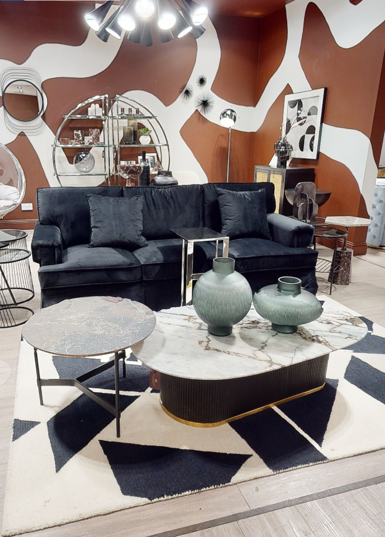 Ralph three seat black velvet sofa with matching throw pillows and sleek metal legs in black velvet