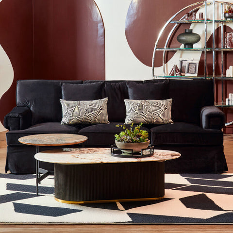 Ralph three seat black velvet sofa with two geometric patterned throw pillows for stylish living room seating