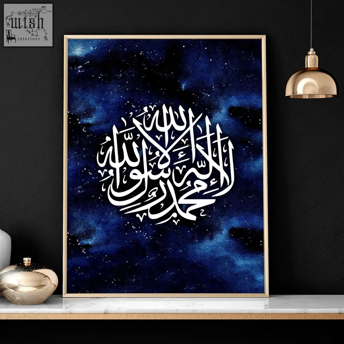 A framed islamic calligraphy wall art print with white script on deep blue cosmic background in a gold frame for ramadan decor