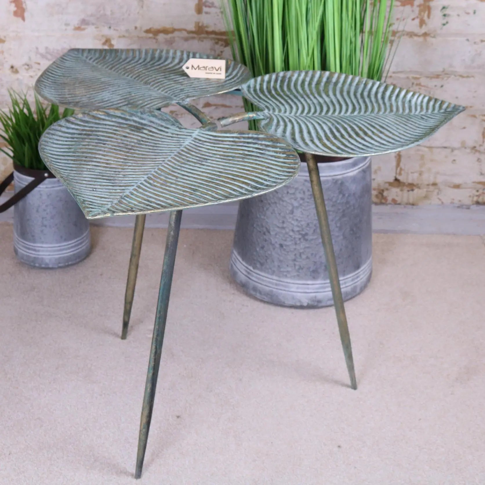 Green patina metal ramai three leaf side table shaped like a textured three leaf plant perfect for living rooms