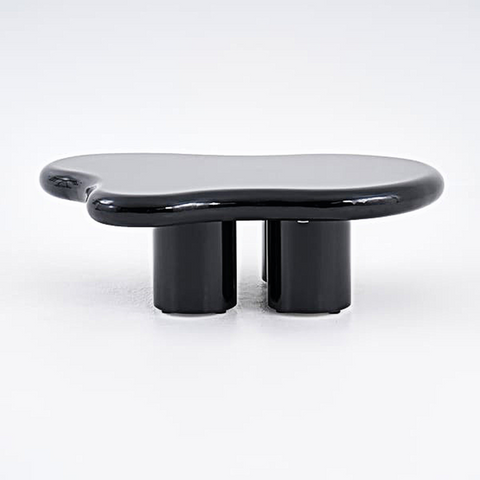 Black glossy ramy coffee table with smooth organic top supported by two cylindrical legs for living room use